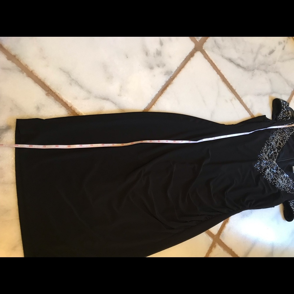Beautiful black dress .worn ones . Ruse size xs, s